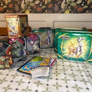 Lot Pokemon Tins and 819 cards